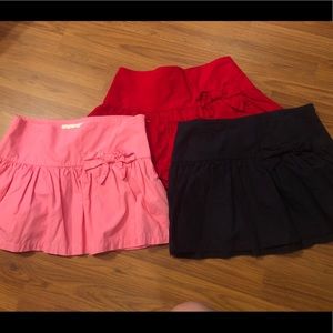 Three skirts with a cute bow in the side